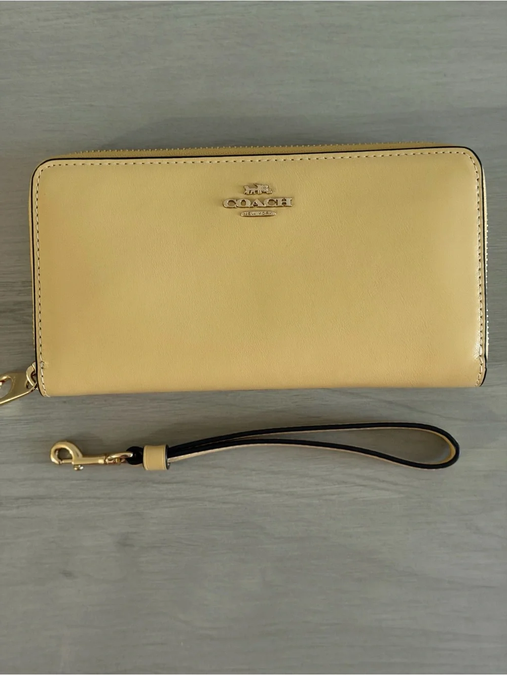 Coach Pale Yellow Leather Zip Wristlet Wallet with Gold Logo